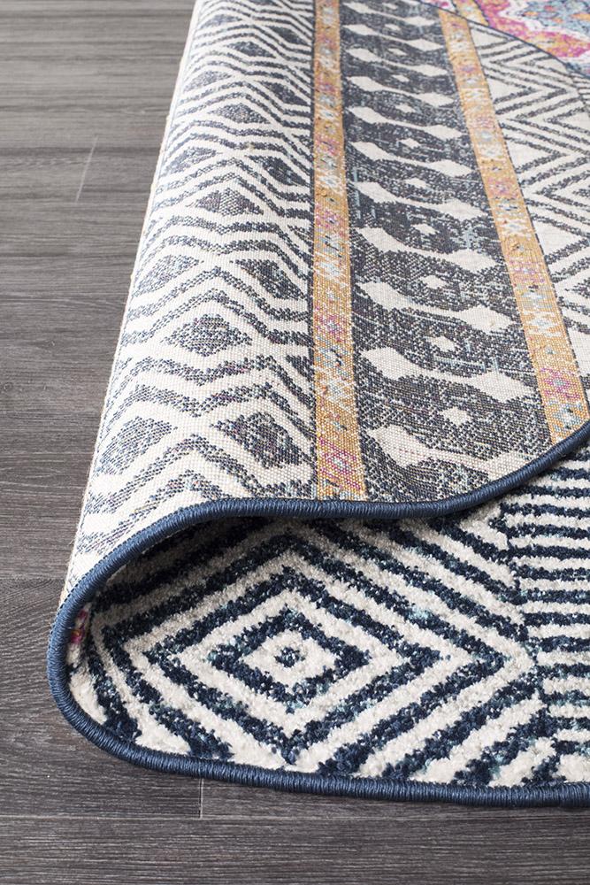 Floor Rug Coloured Tribal Design backing of round rug