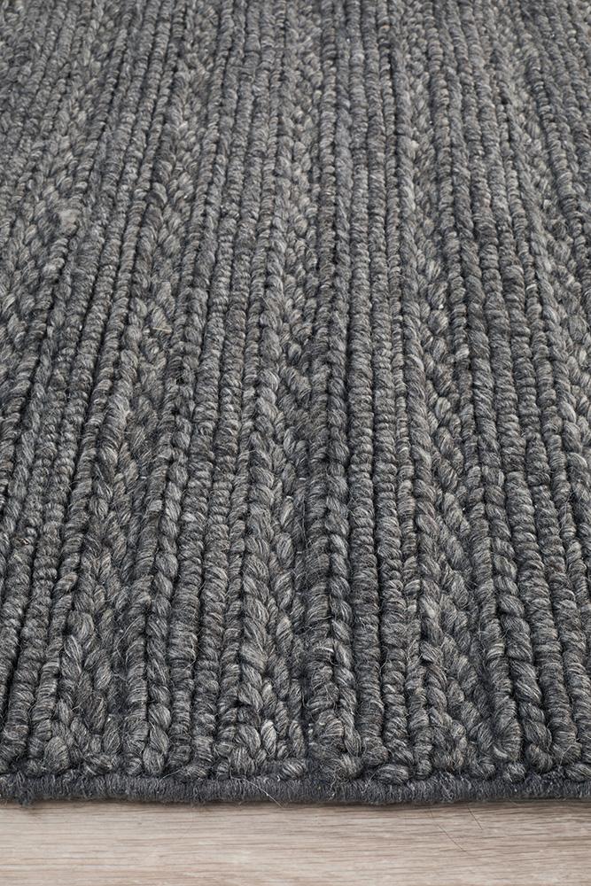 Handwoven Charcoal Rug High Low Feature